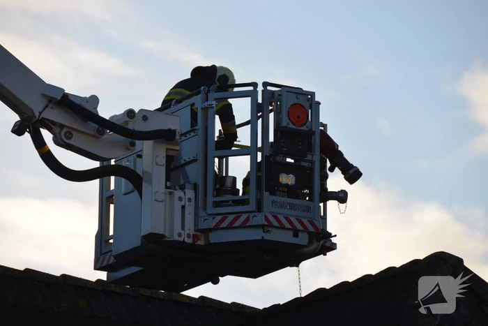 Schoorsteen geveegd na brand