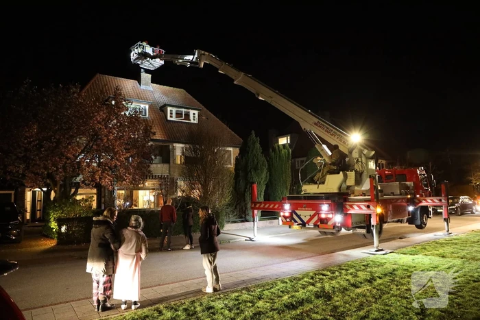 Veel rook door schoorsteenbrand