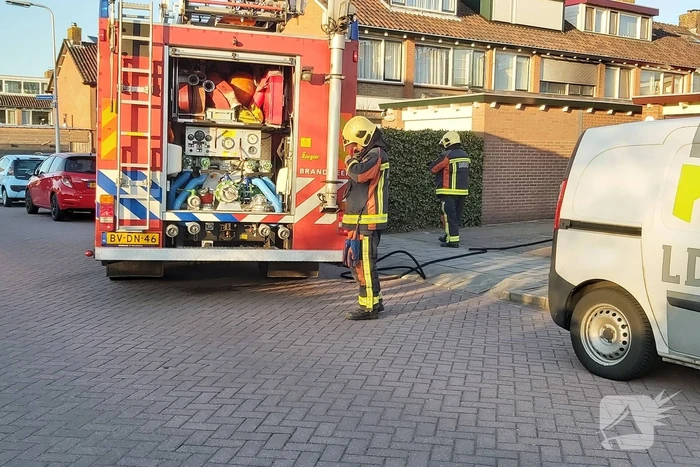 Brandweer blust brandende tuinset