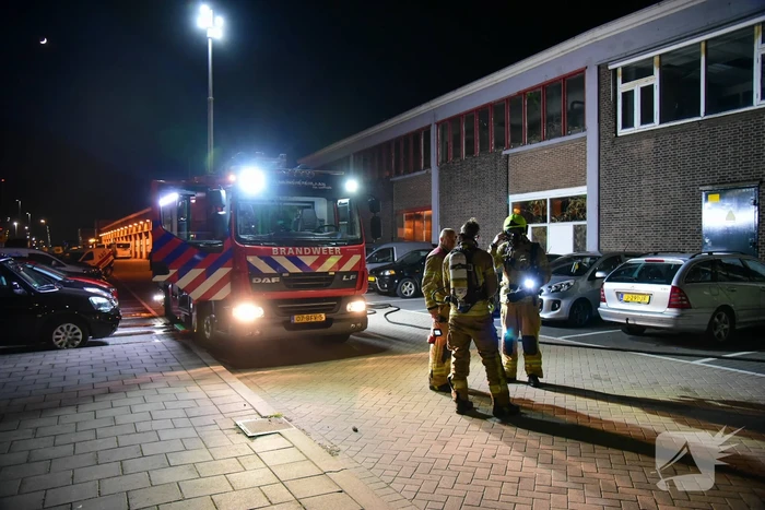 Brand in portiek van woning