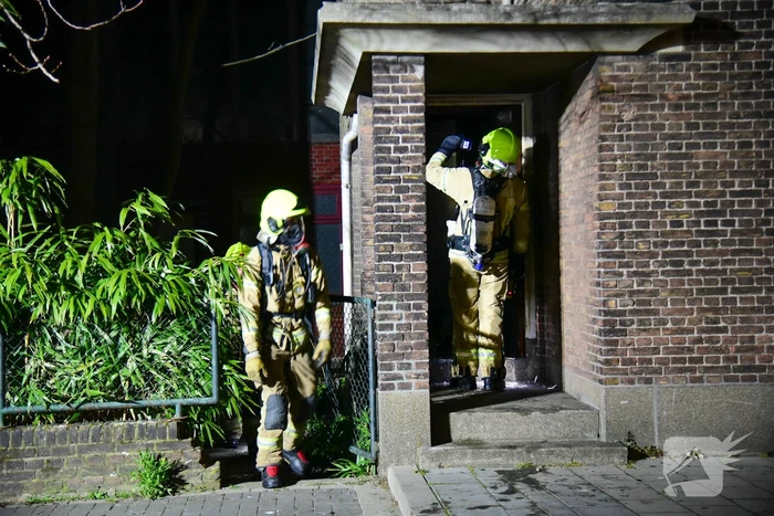 Brand in portiek van woning