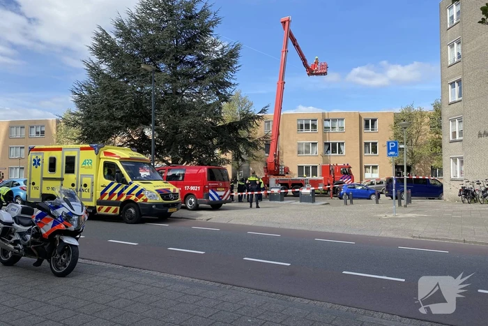 Meerdere bewoners door brand opgesloten in woningen