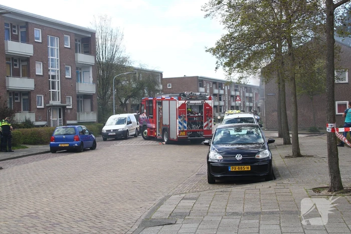 Explosie bij brand in portiekwoning
