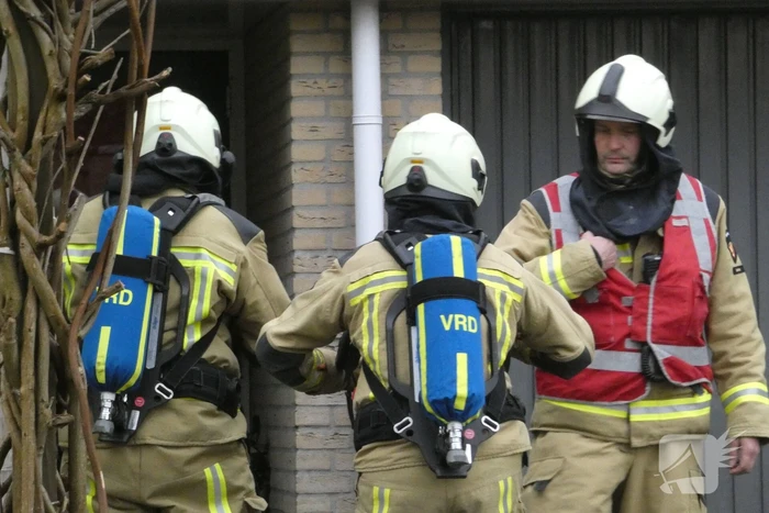 Brand in schoorsteen van woning
