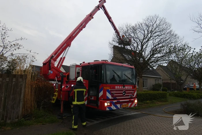 Brand in schoorsteen van woning
