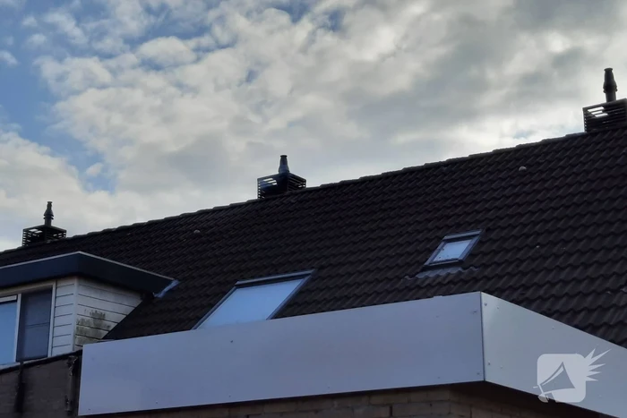 Brand in schoorsteen van woning