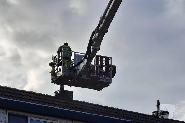 Brand in schoorsteen van woning