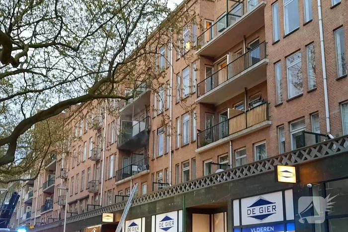 Uitslaande brand in portiekwoning
