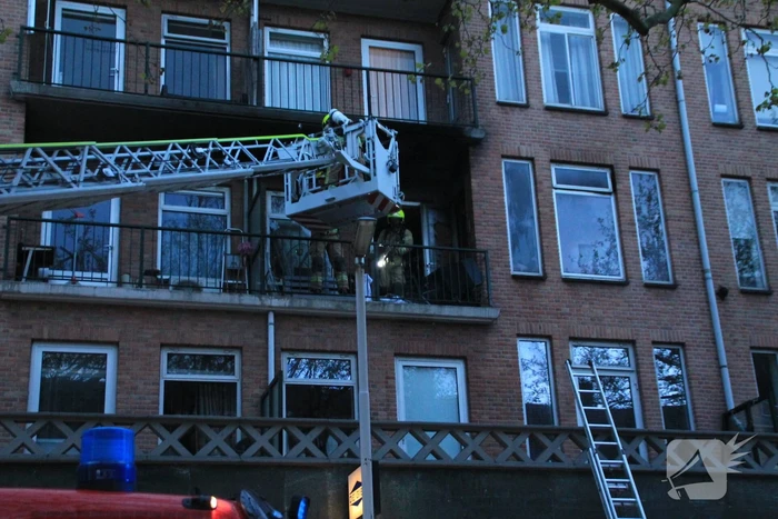 Uitslaande brand in portiekwoning