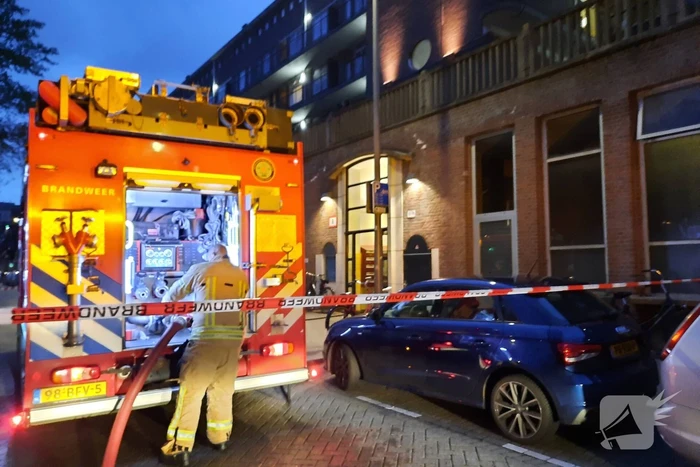 Uitslaande brand in portiekwoning