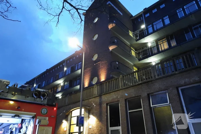 Uitslaande brand in portiekwoning