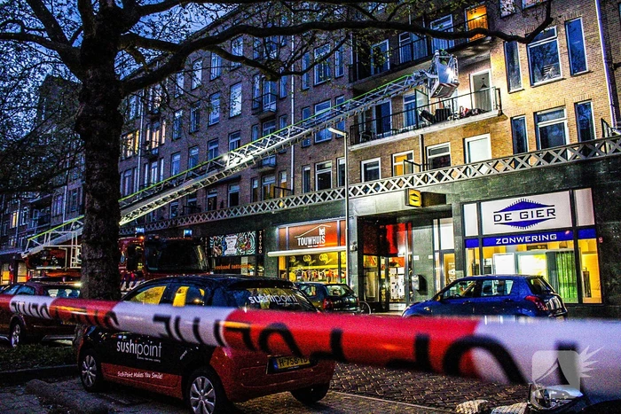 Uitslaande brand in portiekwoning