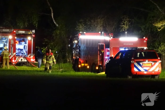 Brand in bos nabij woning