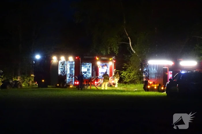 Brand in bos nabij woning