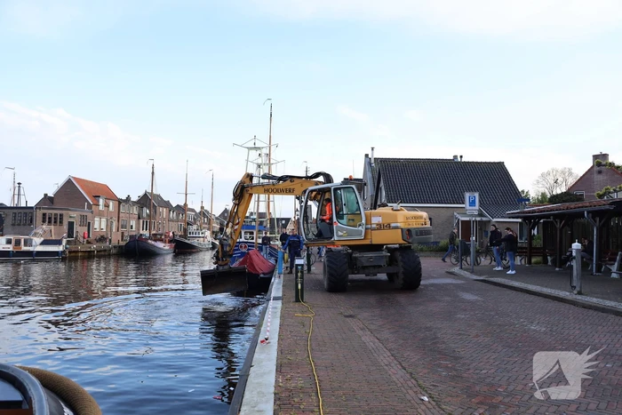 Scooter raakt te water bij ligplaats van watertaxi