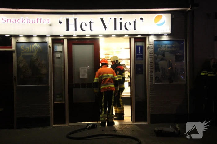 Brandende bakplaat in snackbar veroorzaakt schade