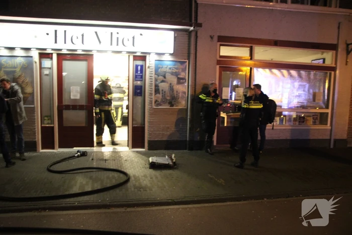 Brandende bakplaat in snackbar veroorzaakt schade