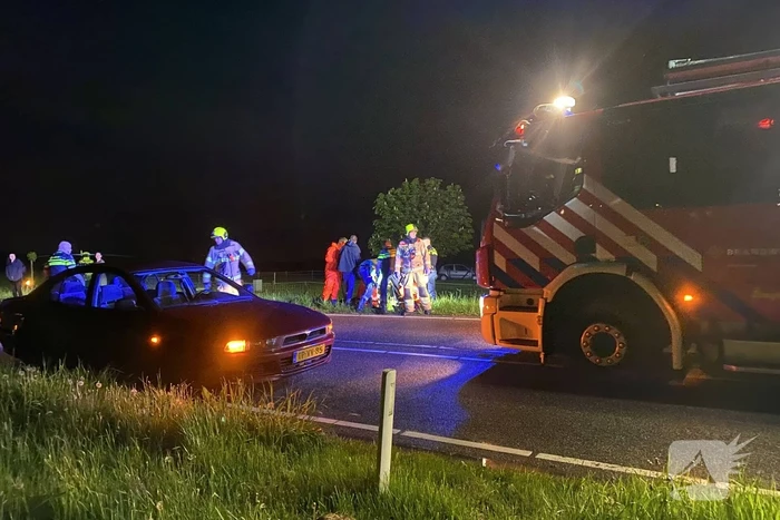 Auto te water, meerdere gewonden
