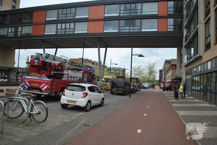 Brand in keuken van flatwoning