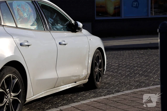 Botsing tussen personenauto en scooter