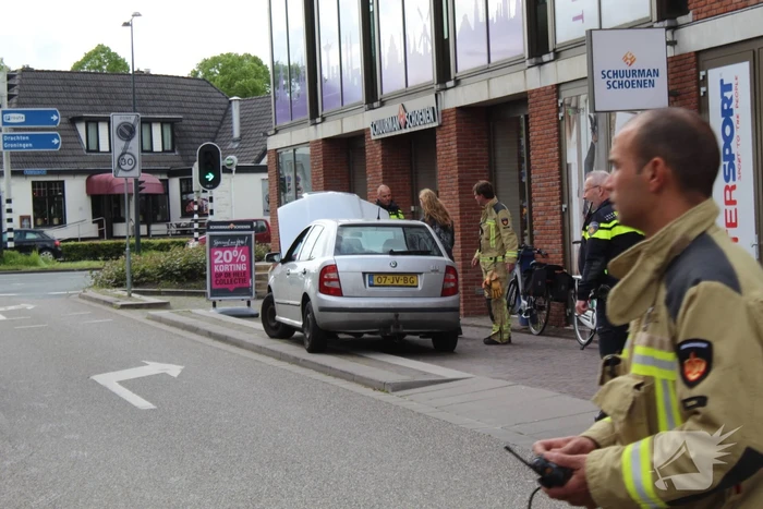 Auto in brand in parkeergarage