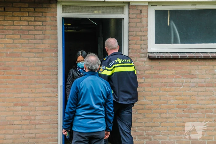 Brand in kelderbox van portiekwoning