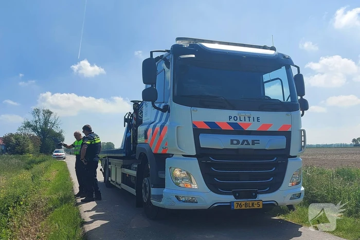 Bestuurder driewieler belandt in sloot