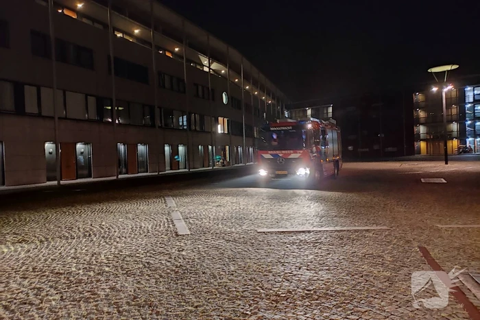 Karton vat vlam tegen woning