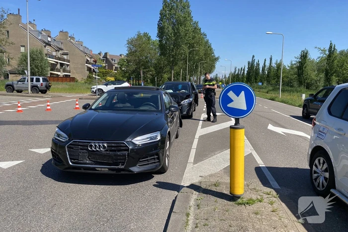 Kettingenbotsing tussen drie personenwagens