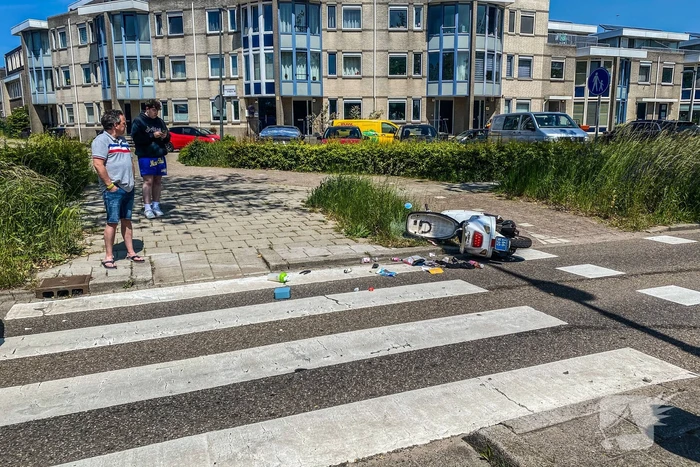 Scooter aangereden door personenauto