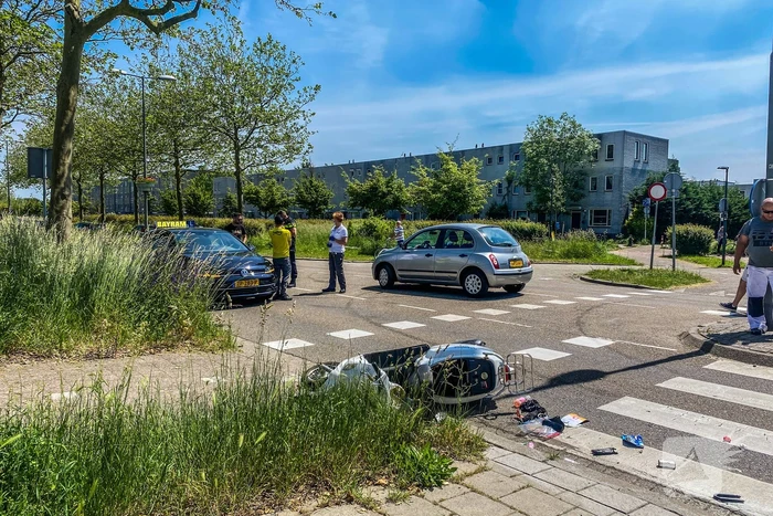 Scooter aangereden door personenauto