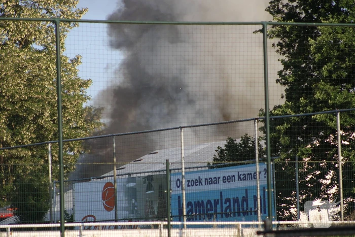 Uitslaand brand in bedrijfspand