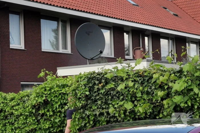 Schuur achter woning in brand