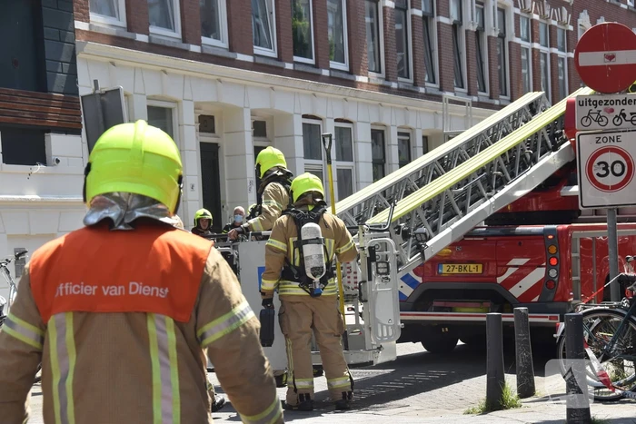 Forse rookontwikkeling bij brandt uit schoorsteen