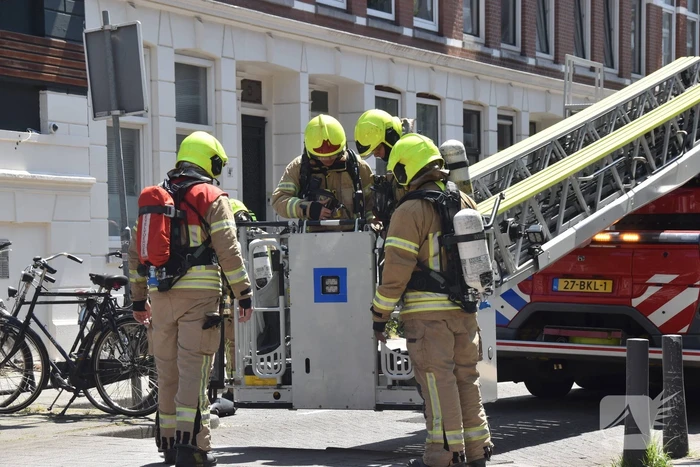 Forse rookontwikkeling bij brandt uit schoorsteen