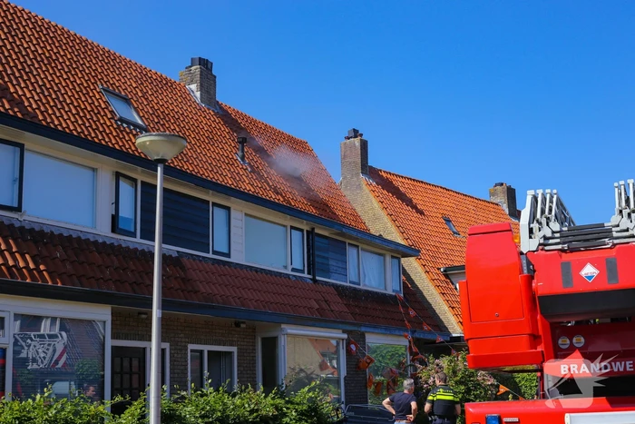 Grijze rookontwikkeling brand in woning