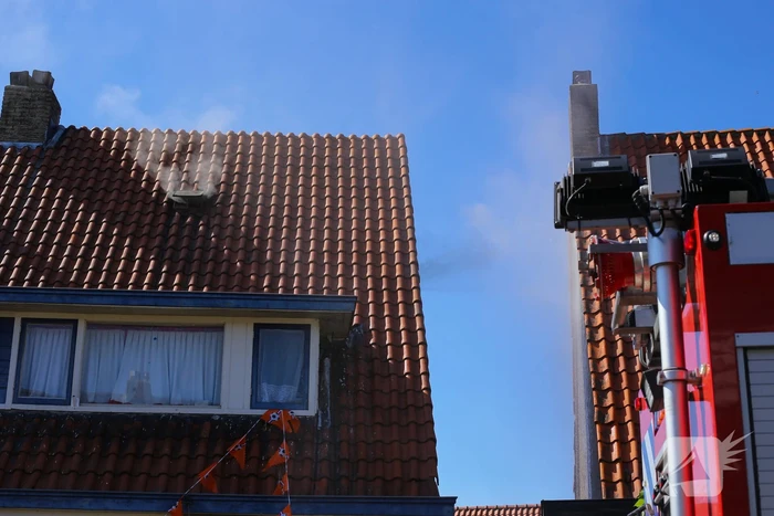 Grijze rookontwikkeling brand in woning