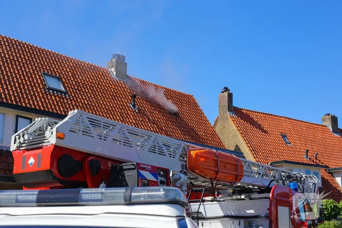 Grijze rookontwikkeling brand in woning