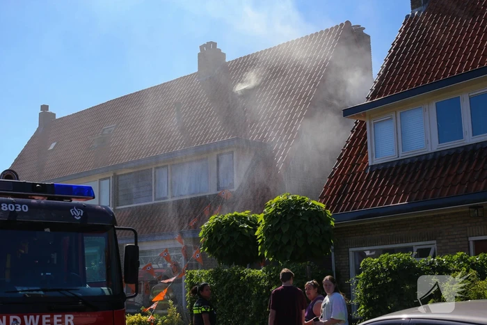 Grijze rookontwikkeling brand in woning