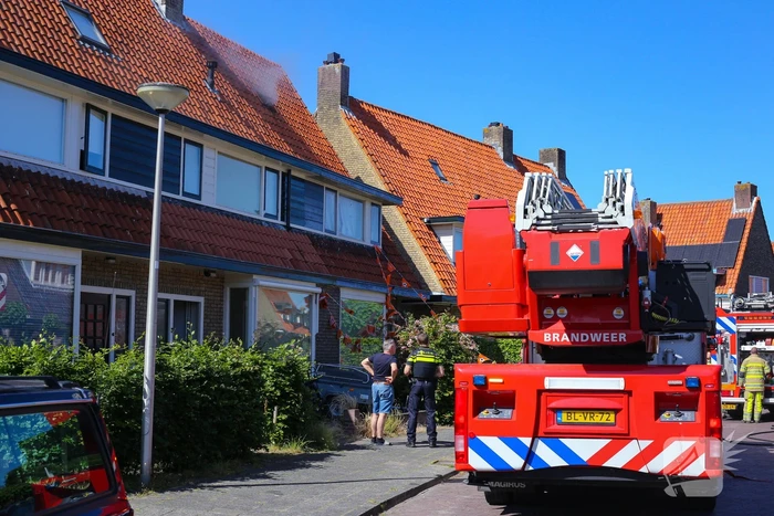 Grijze rookontwikkeling brand in woning