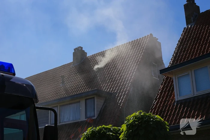 Grijze rookontwikkeling brand in woning