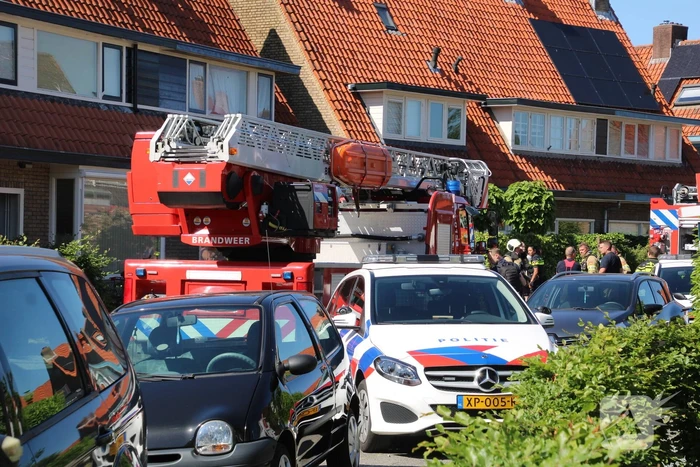 Grijze rookontwikkeling brand in woning