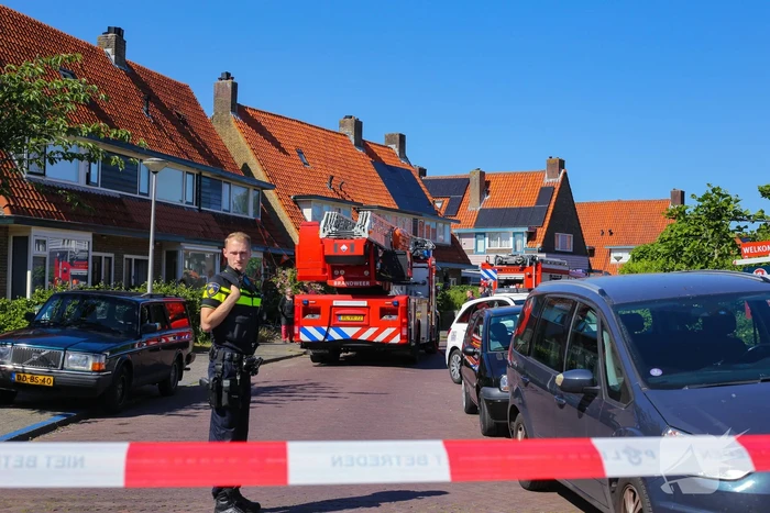 Grijze rookontwikkeling brand in woning