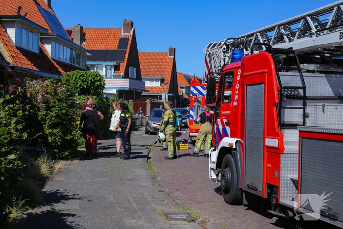 Grijze rookontwikkeling brand in woning
