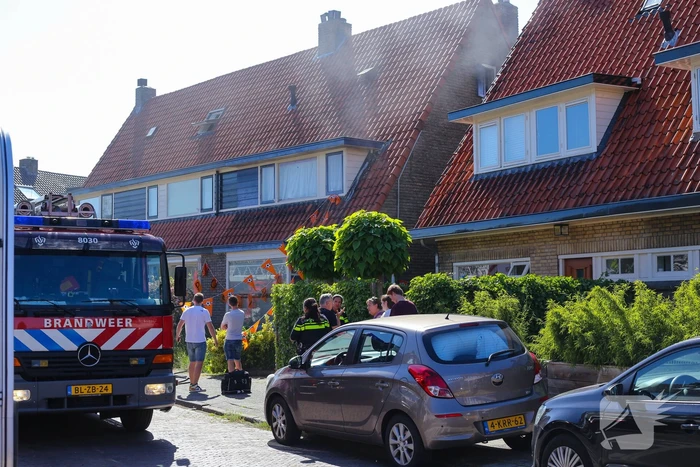 Grijze rookontwikkeling brand in woning