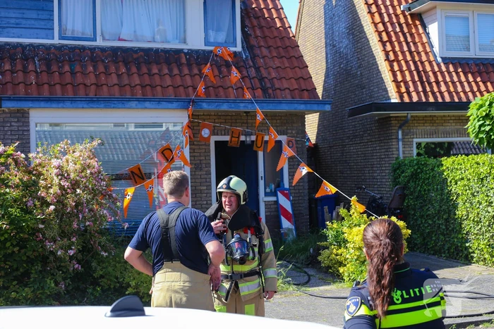 Grijze rookontwikkeling brand in woning