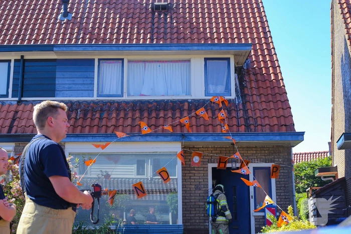 Grijze rookontwikkeling brand in woning