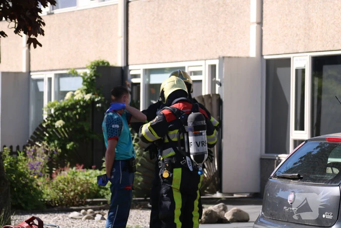 Flinke rookwolken bij brand in keuken