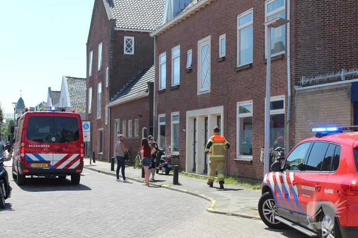 Brand in woning boven winkelpand