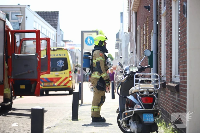 Brand in woning boven winkelpand